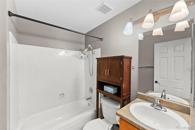 full bathroom featuring vanity, toilet, and shower / tub combination