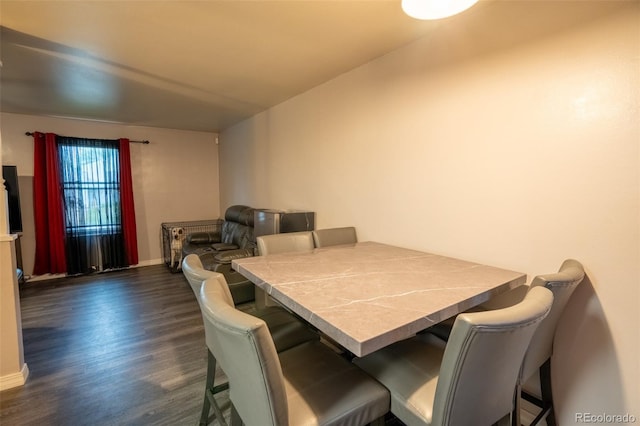 10050 Holland Ct, Broomfield, CO 80021 - dining room with dark wood-style floors and baseboards