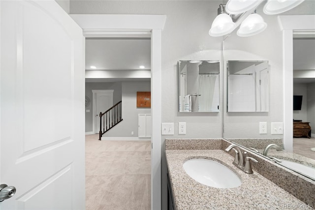 5450 Uinta St, Denver, CO 80238 - bathroom featuring vanity and recessed lighting