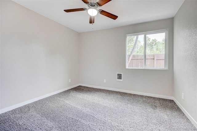 1216 Norwood Ave, Colorado Springs, CO 80905 - carpeted empty room with a ceiling fan and baseboards