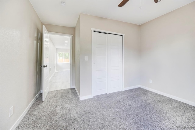 1216 Norwood Ave, Colorado Springs, CO 80905 - unfurnished bedroom with carpet, a closet, and a ceiling fan