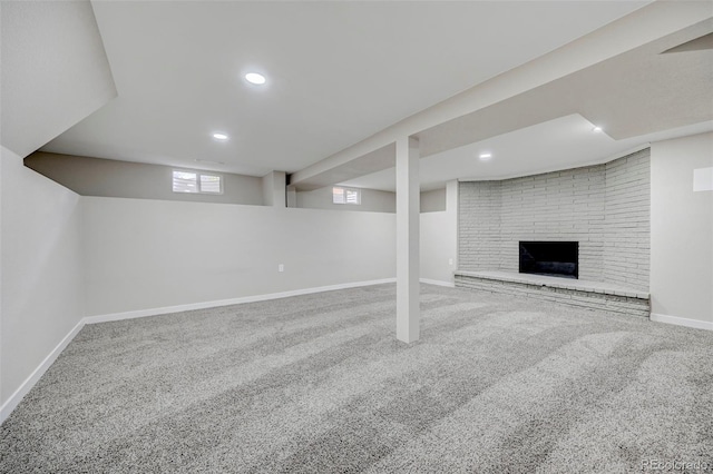 1216 Norwood Ave, Colorado Springs, CO 80905 - basement featuring carpet flooring, a fireplace, and recessed lighting