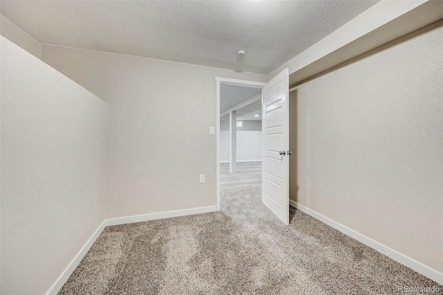 1216 Norwood Ave, Colorado Springs, CO 80905 - spare room featuring carpet and a textured ceiling