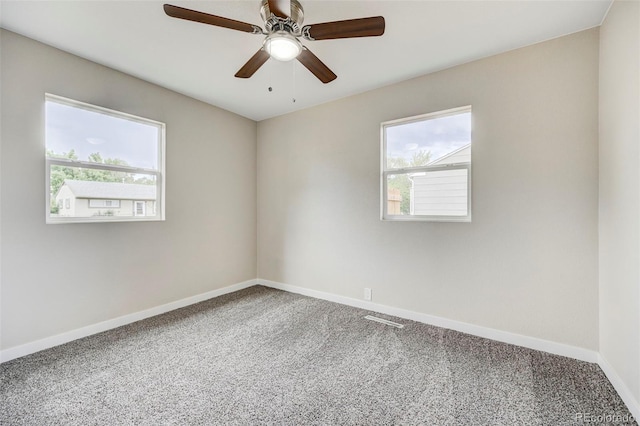 1216 Norwood Ave, Colorado Springs, CO 80905 - carpeted spare room with baseboards and ceiling fan