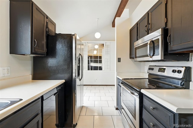 10102 W Ida Ave Unit 214, Littleton, CO 80127 - kitchen featuring appliances with stainless steel finishes, dark brown cabinetry, light tile patterned floors, and light countertops