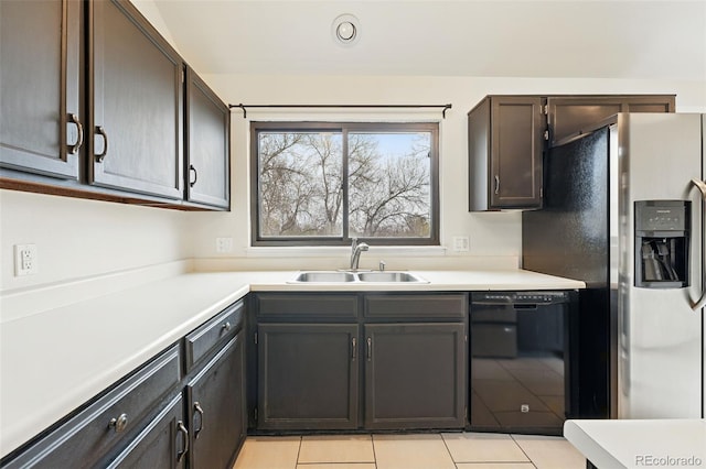 10102 W Ida Ave Unit 214, Littleton, CO 80127 - kitchen with a sink, black dishwasher, light countertops, stainless steel fridge with ice dispenser, and light tile patterned floors