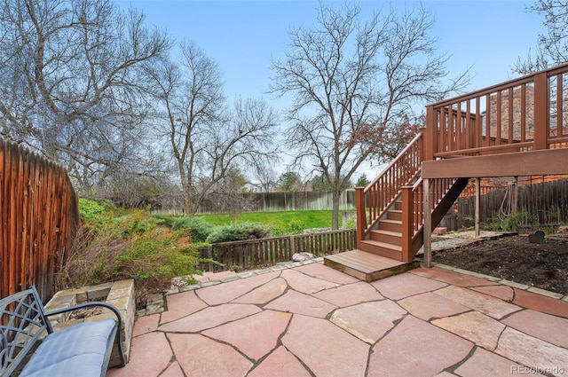 10102 W Ida Ave Unit 214, Littleton, CO 80127 - view of patio featuring stairs, a fenced backyard, and a wooden deck