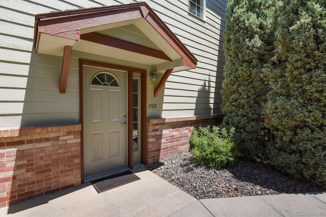 11085 Huron St Unit 1108, Northglenn, CO 80234 - property entrance with brick siding
