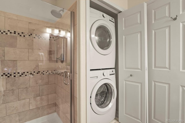 11085 Huron St Unit 1108, Northglenn, CO 80234 - washroom featuring stacked washer / drying machine