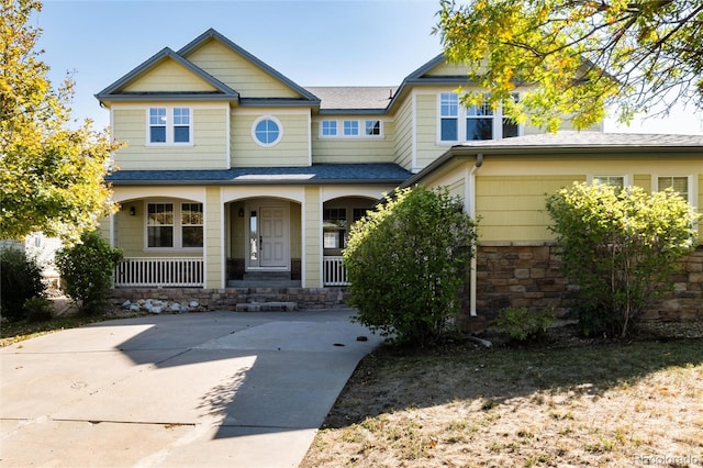 craftsman-style home featuring covered porch