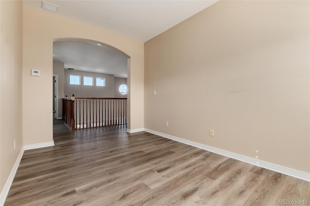 spare room featuring hardwood / wood-style floors