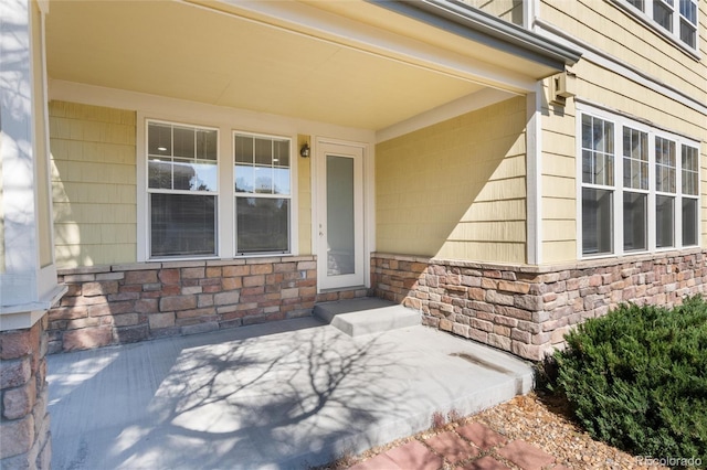 property entrance with a patio