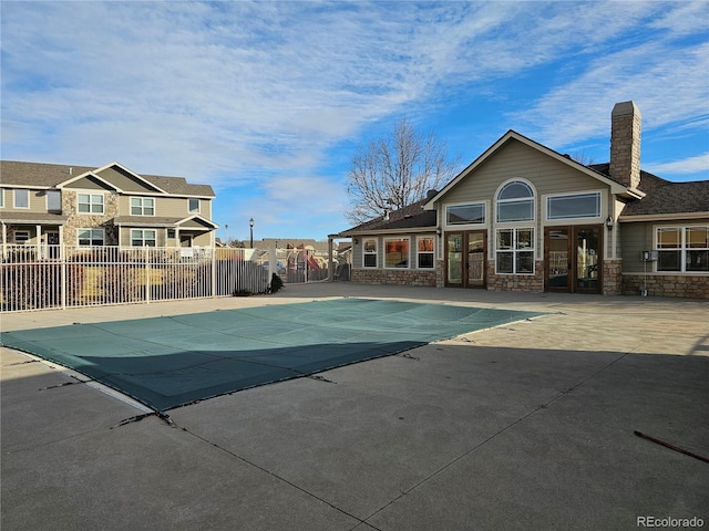 view of pool featuring a patio