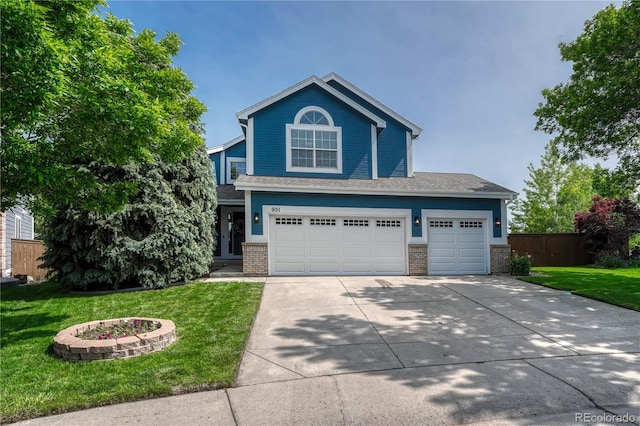 901 Sage Sparrow Cir, Highlands Ranch, CO 80129 - view of front of house with brick siding, driveway, roof with shingles, and an attached garage