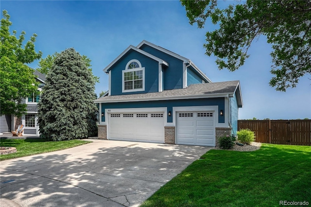 901 Sage Sparrow Cir, Highlands Ranch, CO 80129 - view of front of home with concrete driveway, brick siding, and an attached garage