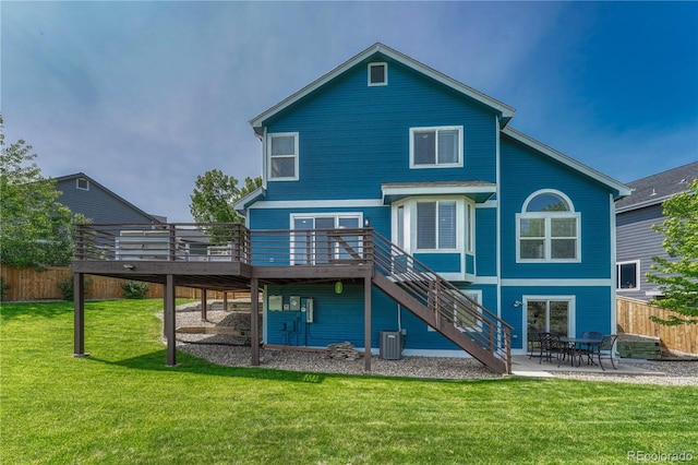 901 Sage Sparrow Cir, Highlands Ranch, CO 80129 - rear view of house featuring a deck, stairs, a patio area, and central air condition unit