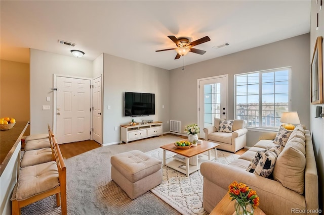 2705 S Danube Way Unit 306, Aurora, CO 80013 - living room with ceiling fan and baseboards