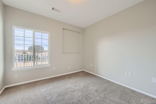 2705 S Danube Way Unit 306, Aurora, CO 80013 - empty room featuring baseboards and carpet