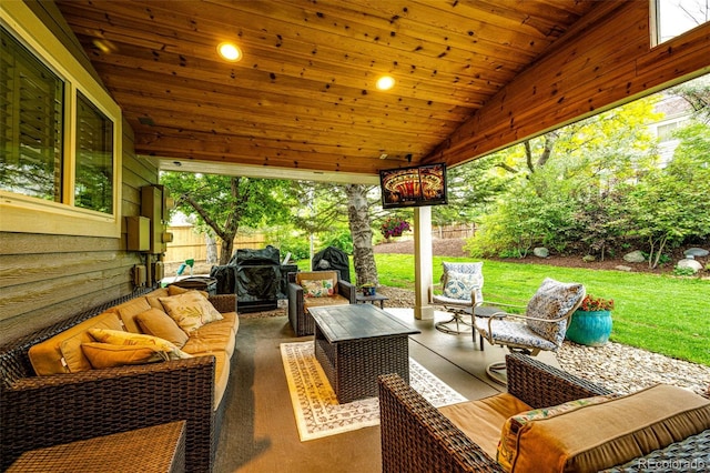 view of patio / terrace with outdoor lounge area and fence