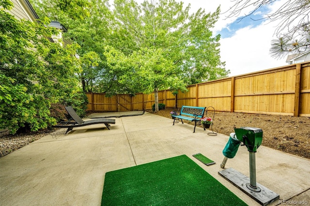 view of patio with a fenced backyard