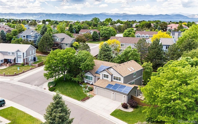 drone / aerial view with a mountain view and a residential view