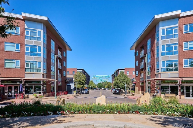 2958 Syracuse St Unit 316, Denver, CO 80238 - view of asphalt street with sidewalks, curbs, and street lighting