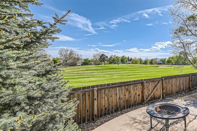 view of patio with an outdoor fire pit