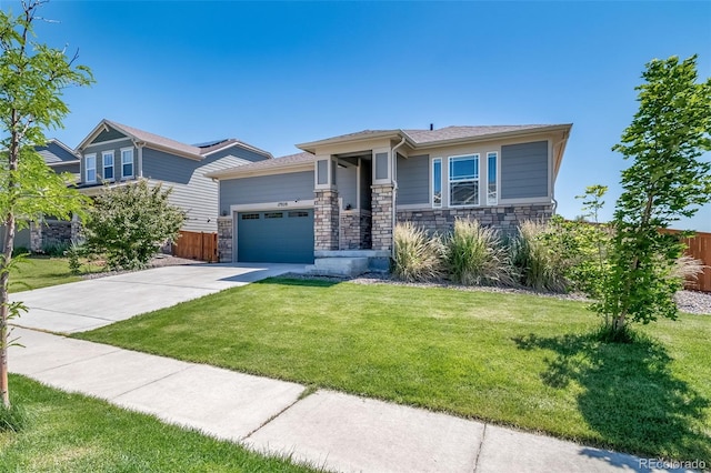 17028 Osage St, Broomfield, CO 80023 - view of front of house with stone siding, driveway, and an attached garage