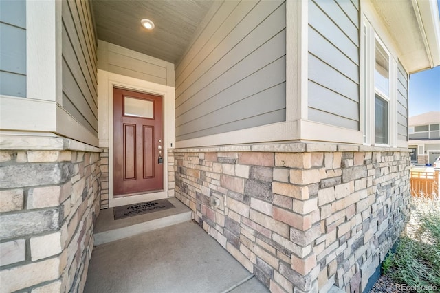 17028 Osage St, Broomfield, CO 80023 - property entrance featuring stone siding