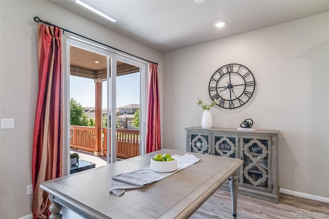 17028 Osage St, Broomfield, CO 80023 - dining space featuring light wood finished floors and recessed lighting