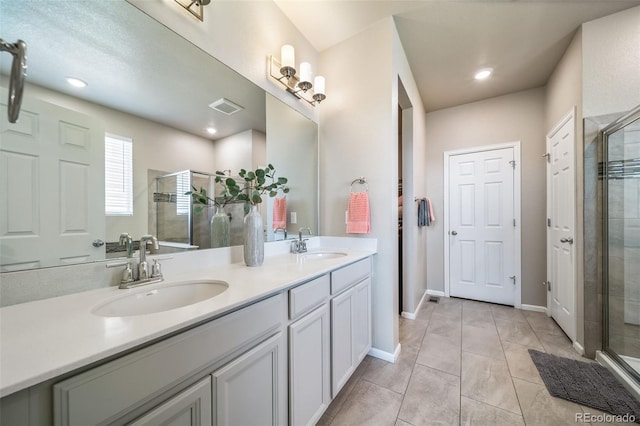 17028 Osage St, Broomfield, CO 80023 - bathroom with a stall shower, double vanity, and recessed lighting