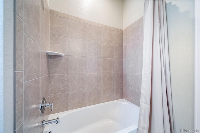 17028 Osage St, Broomfield, CO 80023 - bathroom featuring shower / tub combo with curtain
