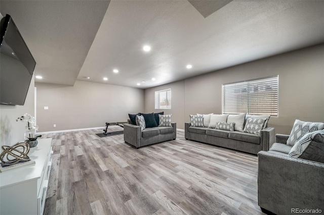 17028 Osage St, Broomfield, CO 80023 - living area with light wood-type flooring and recessed lighting