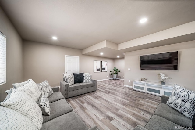 17028 Osage St, Broomfield, CO 80023 - living room with light wood-type flooring and recessed lighting