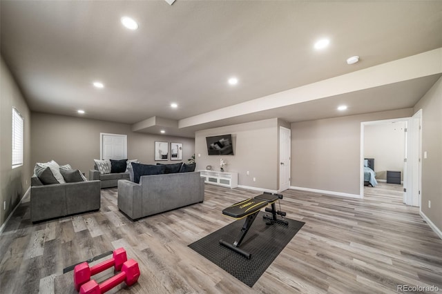17028 Osage St, Broomfield, CO 80023 - living room with wood finished floors and recessed lighting