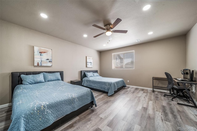 17028 Osage St, Broomfield, CO 80023 - bedroom featuring wood finished floors, recessed lighting, and a ceiling fan