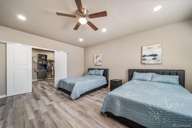 17028 Osage St, Broomfield, CO 80023 - bedroom featuring wood finished floors, recessed lighting, a closet, and ceiling fan