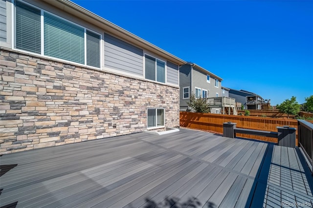 17028 Osage St, Broomfield, CO 80023 - wooden terrace with a fenced backyard