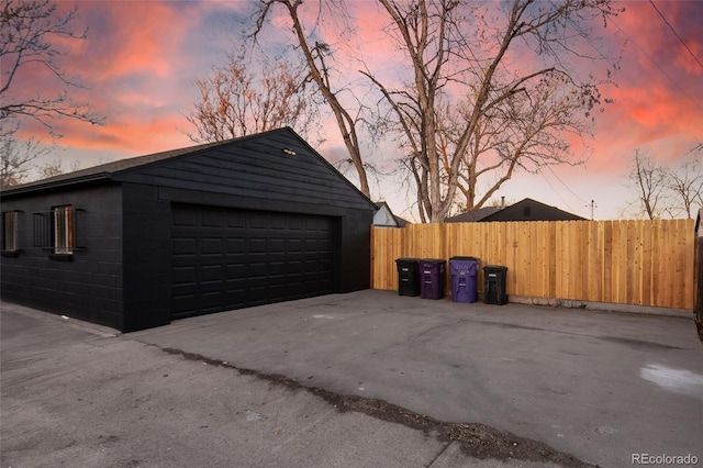 garage featuring fence