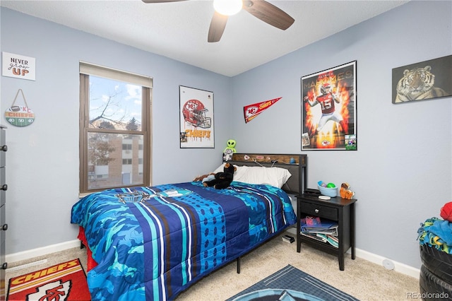 bedroom featuring carpet floors, ceiling fan, and baseboards