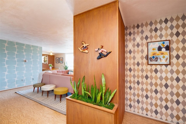living area with carpet flooring