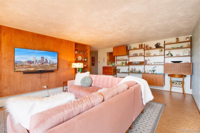 living room featuring wooden walls