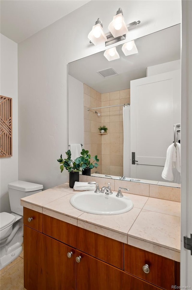 bathroom with toilet, tile patterned floors, vanity, visible vents, and a shower with curtain