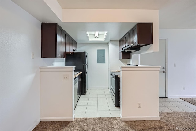 kitchen with light carpet, dark brown cabinets, appliances with stainless steel finishes, and electric panel