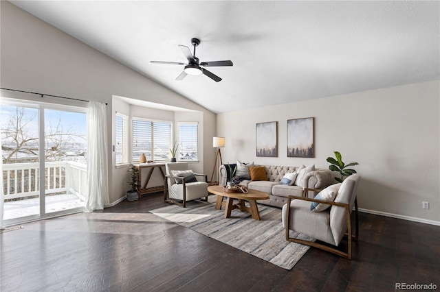 living room with lofted ceiling, wood-type flooring, baseboards, and a ceiling fan