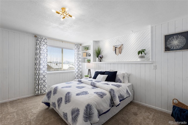 carpeted bedroom with a textured ceiling