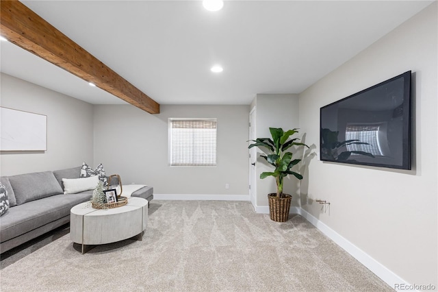 carpeted living area with recessed lighting, beamed ceiling, and baseboards