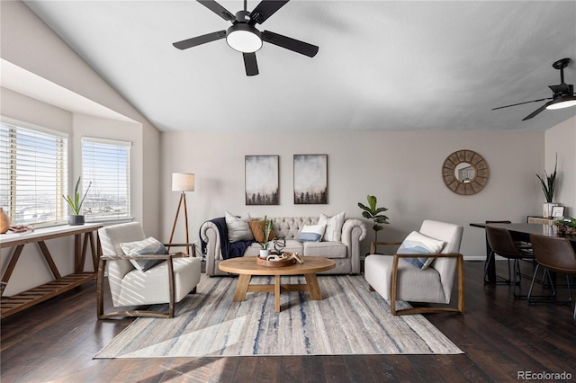 living area featuring lofted ceiling, a ceiling fan, and hardwood / wood-style floors