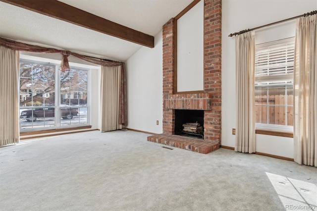 unfurnished living room featuring a fireplace, light colored carpet, and vaulted ceiling with beams