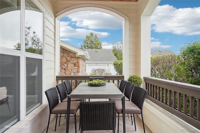 balcony featuring outdoor dining space